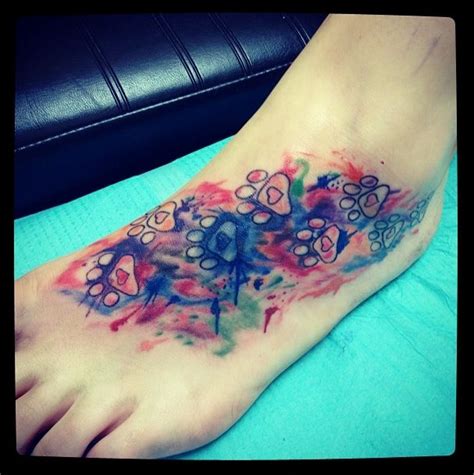 Maybe you would like to learn more about one of these? My 5th tattoo :) watercolor paw prints! #WatercolorTattoo ...