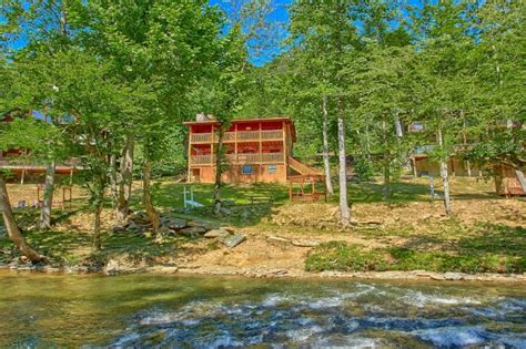 A tennessee rental cabin is a perfect way to enjoy the mountains of east tennessee. 2-Bedroom Cabin Near A River in the Smoky Mountains
