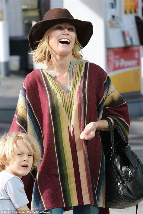 Julie Bowen Is Cowgirl Chic In Hat And Poncho As She Takes Son To The
