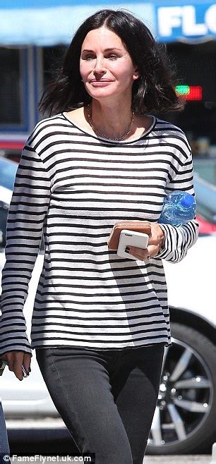Courteney Cox In Striped Long Sleeve T Shirt As She Shops For Home