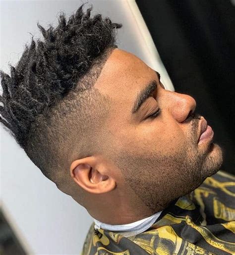 Drop fade haircut is a skin fade variation, where the gradient cut falls deeper behind the ears and creates a sleek arc shape. 18 Amazing High Top Fade Dreads for Men to Revamp Their Look