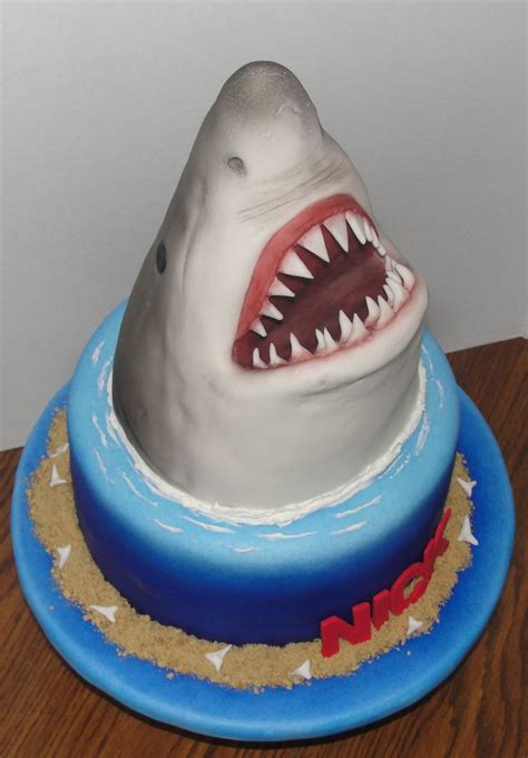 Sometimes the simplest solutions can also be the prettiest. Jaws Birthday Cake - CakeCentral.com
