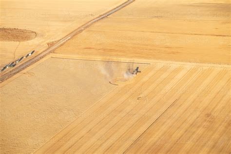 Image Of Aerial View Of Crops Being Harvested Austockphoto
