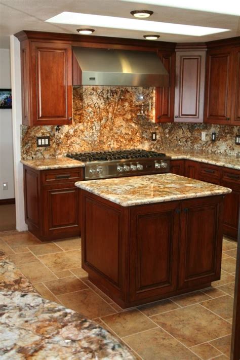 The stone is light grey in color and has gorgeous golden yellow highlights and black speckling. Cherry Wood Cabinets with granite countertops. | Yelp
