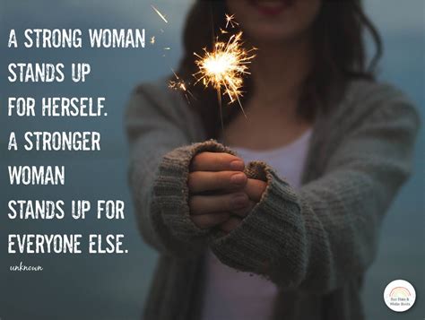 a woman holding a sparkler in her hand with a quote on it that reads, a