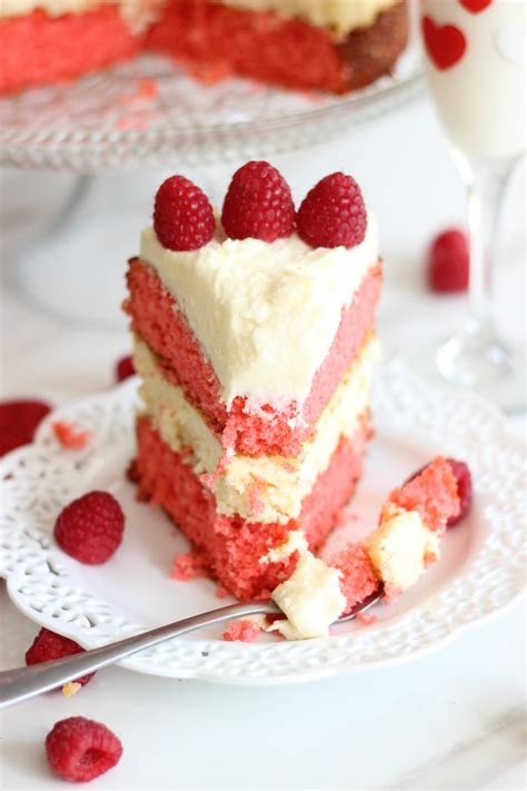 Rich, moist cake is filled with an easy raspberry filling and topped with luscious cream cheese frosting. Raspberry White Chocolate Cheesecake Cake