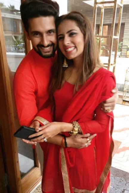 Ravi Dubey With His Wife Sargun Mehta At A Wedding
