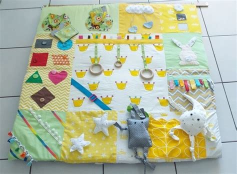 Maybe you would like to learn more about one of these? Tapis d'éveil pour bébés. J'ai utilisé des carrés de coton ...