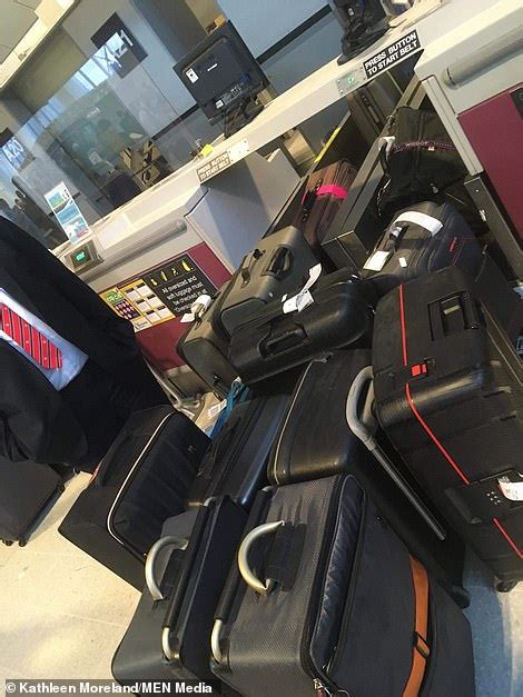 Manchester Airport Passengers Crawl Along Baggage Conveyor Belts Review Guruu