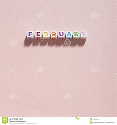Multicolored February On A Pale Pink Background Stock Photo Image Of