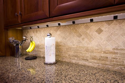Wood floors in kitchen with white cabinets. ANGLED POWER STRIPS - Modern - Lighting - other metro - by ...