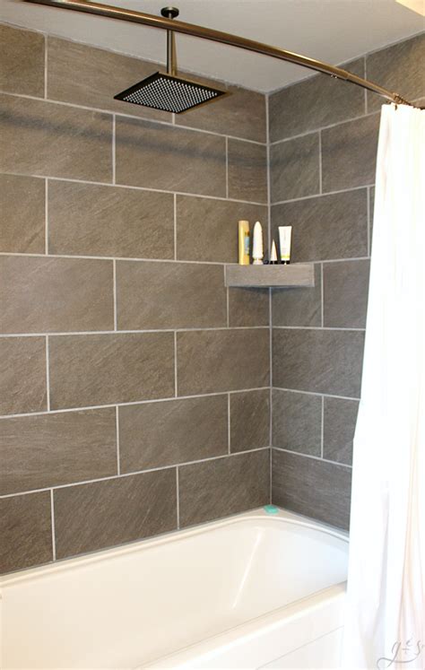 Out of tile in small sections with a layer of tiles are getting tiled of wall. DIY: How to Tile Shower Surround Walls in 2020 | Shower ...