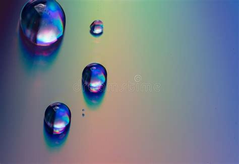 Water Drops On A Rainbow Background Stock Image Image Of Closeup