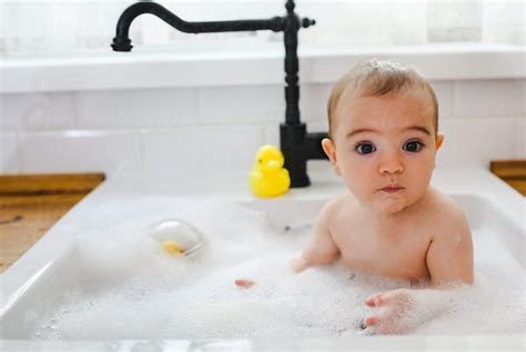 When you bathe a baby in the kitchen sink or communal bathtub, make sure to thoroughly scrub the area before putting the baby in it. Baby Bath Kitchen Sink: 10 Tips You Can't Miss - Baby Bath ...