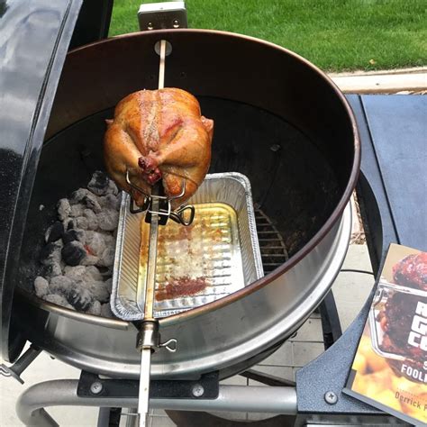 how to rotisserie grill a chicken on a weber kettle grill girl recipe aria art