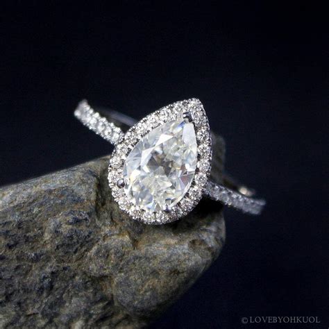 Forever Brilliant Pear Moissanite Diamond Halo Engagement Ring Kt