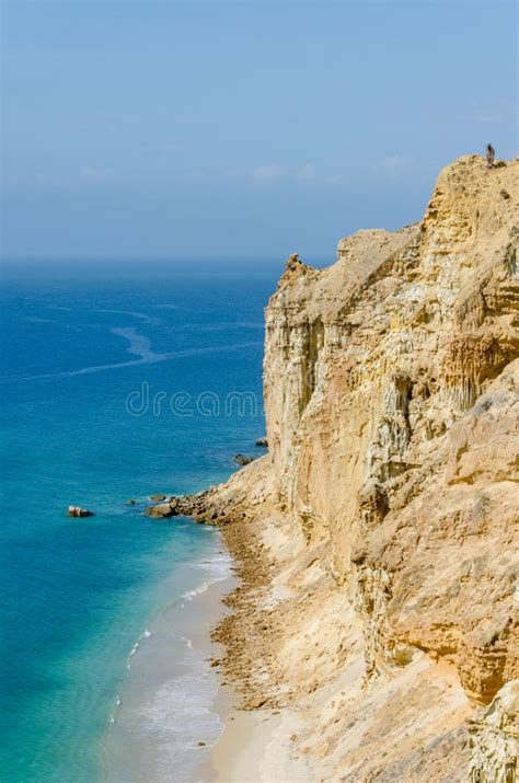 Impressive Cliffs With Turquoise Ocean At The Coast At Caotinha Angola