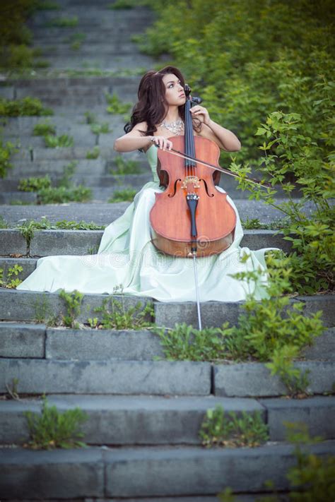 Mr biden is not the first president to stumble on the stairs to the plane. Romantic Girl Playing Cello Stock Image - Image of color ...