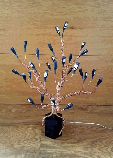 Early march of this year, i cut off all the branches from our fruitless mulberry tree. Copper Bottle Tree with LED Lights | Bottle tree, Bottle trees, Tree art
