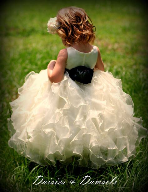 Little Girls Ivory Organza Ruffled Flower Girl Dress With Black Sash