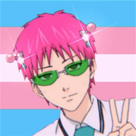 A Man With Pink Hair And Green Glasses Making The Peace Sign