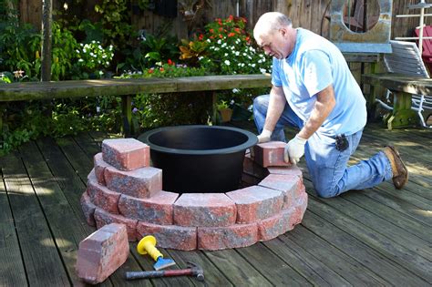 You'll need to dig a hole, place an underlayment and liner inside follow these tips to choose the proper place for your diy fish pond above ground pond | Fill the rigid liner with water to 2 ...