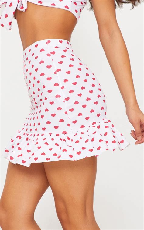 White Love Heart Print Frill Hem Mini Skirt Prettylittlething Ca