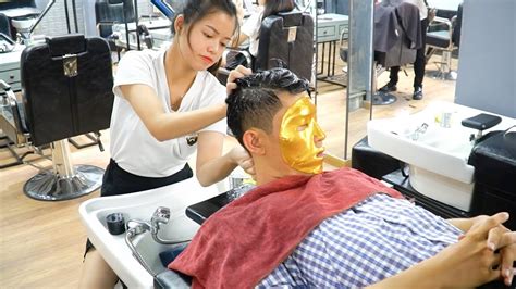 Relaxing Massage Golden Mask Beautiful Young Vietnamese Girl Shampooing Relax Hands And Feet