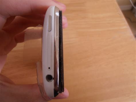 I got my iphone 5 replaced by apple: AT&T iPhone 3GS Battery Expanded and Pushed Out Front ...