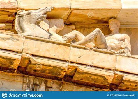 The wall that separates the interior and the remains are a popular tourist attraction. Detail Of Columns And Frieze Of The Parthenon At Acropolis ...