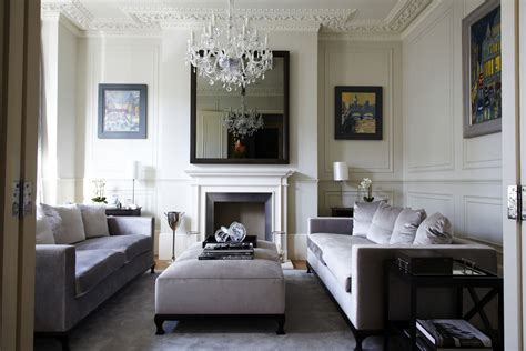 Victorian Style With Pendant Crystal Lamp Grey Sofa And Big Mirror