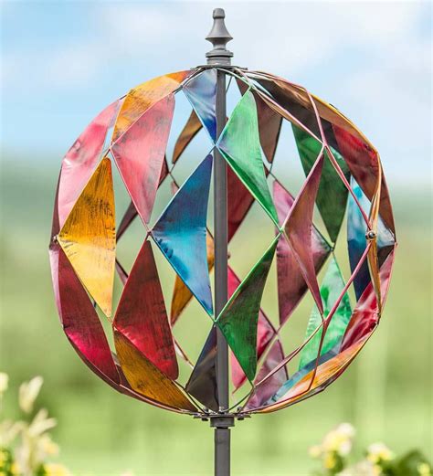 Our Harlequin Ball Wind Spinner Is Inspired By The Colorful Costume Of