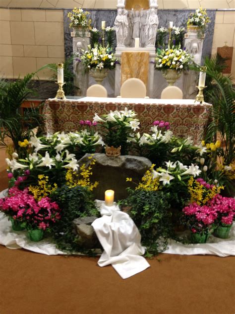 The Altar Is Decorated With Flowers And Candles