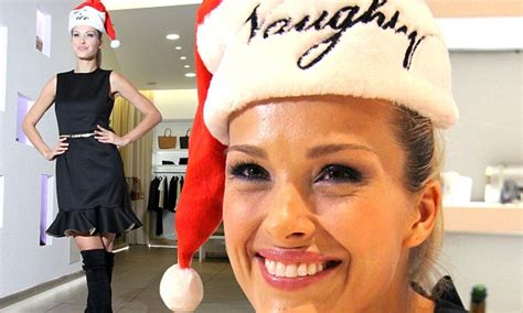 Petra Nemcova Gets Playful In Santa Hat And Thigh High Boots As She