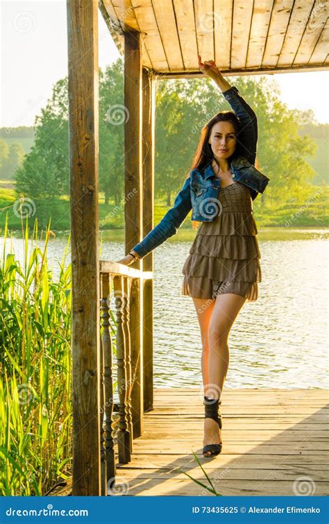 Girl Standing On A Wooden Pier Stock Image Image Of Pond Pretty 73435625