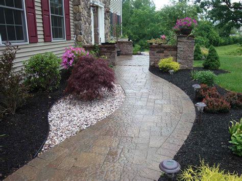 One easy front paver walkway idea that still packs a lot of appeal is incorporating flanking bands that line the walkway on either side. Walkway Landscape Patio Ideas Designs Inspirational ...