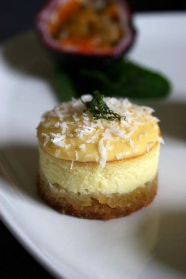 These mini coconut cupcakes topped with passion fruit icing and edible flowers are a tropical passion fruit infuses the icing with real tropical flavor. thepassionatecook: Passion fruit & coconut mini-cheesecakes