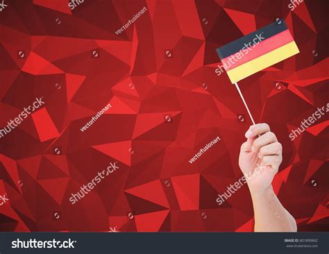 Digital Composite Hand Holding German Flag Stock Photo 601899842