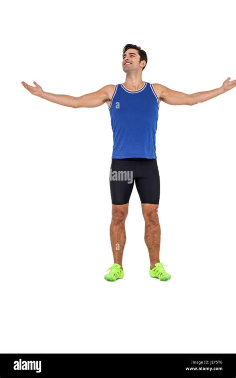 Athlete Standing With Arms Outstretched Stock Photo Alamy