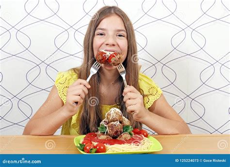 hungry girl eats meatball stock image image of balls 125224073