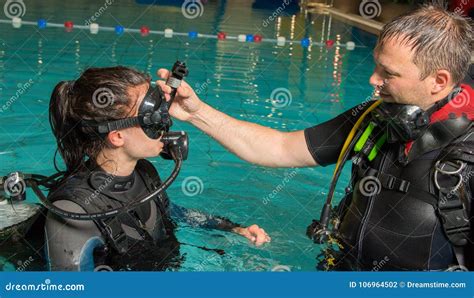 Scuba Diving Course Pool Teenager Girl With Instructor In The Water