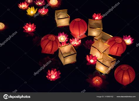 Floating Paper Lanterns On The Water At Night Stock Photo By ©so