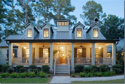This house plan with front porch is all about showing off it's major curb appeal. Tin roof! White house. Columns and front porch. (brick ...