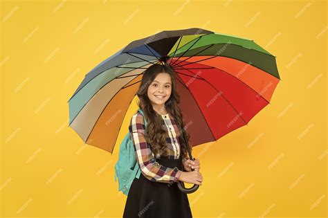 Premium Photo Rainy Weather With Proper Garments On Way To School