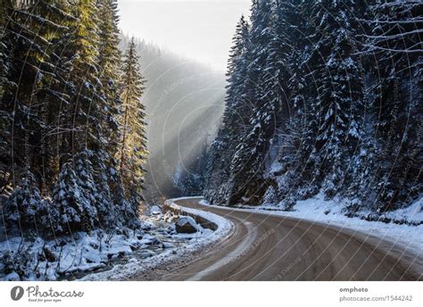 Landscape Of Snowy Winter Road With Curves In The Mountain A Royalty