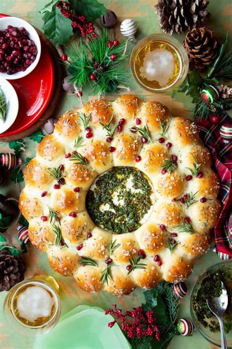 These bread wreaths are made from intertwined pieces of dough with layers of cinnamon and sugar. 27 Holiday Loaves and Christmas Bread Recipes - 31 Daily