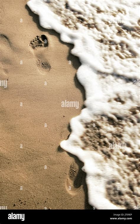 Close Up Footprints On Beach Stock Photo Alamy