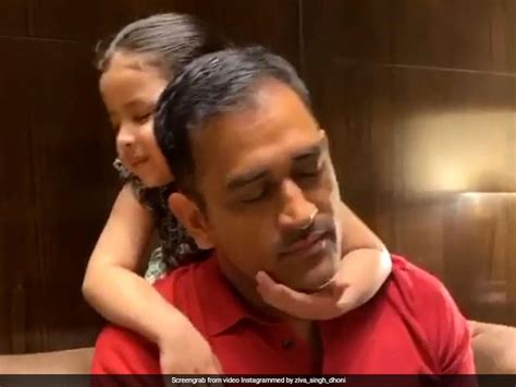 ms dhoni getting massage cuddles from daughter ziva is the most adorable thing you will see