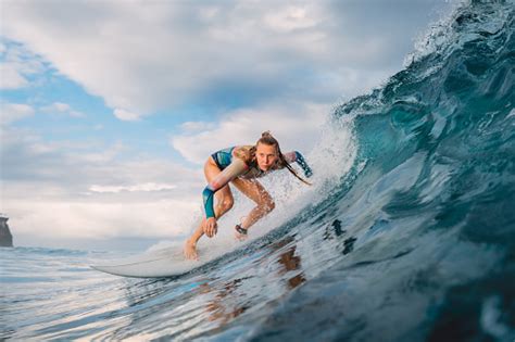 Beautiful Surfer Girl On Surfboard Woman In Ocean During Surfing Surfer