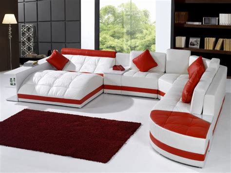 Affordable Sectional Couches In White And Red Combined With Sofa Bed Plus Red Chushion And Rug On White Floor And Wooden Bookcase And Standing Lamp 